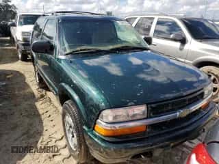 2002 Chevrolet Blazer LS z VIN 1GNCT18W52K187799, wystawiony jako Copart lot #73642634 z przebiegiem Nie podano mil oraz Szkoda całkowita • Salvage title. Historia ofert i sprzedaży dostępna na DreamBid. Obrazek 5.