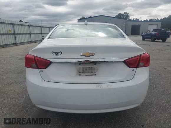 2016 Chevrolet Impala LT z VIN 2G1115S31G9129671, wystawiony jako Copart lot #86301945 z przebiegiem 212 324 mil mil oraz Szkoda całkowita • Salvage title. Historia ofert i sprzedaży dostępna na DreamBid. Obrazek 6.