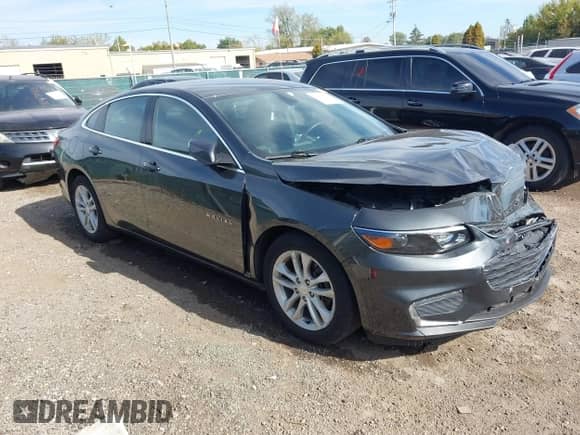2018 Chevrolet Malibu LT z VIN 1G1ZD5ST7JF166538, wystawiony jako IAAI lot #43454660 z przebiegiem 46 901 mil mil oraz . Historia ofert i sprzedaży dostępna na DreamBid. Obrazek 1.
