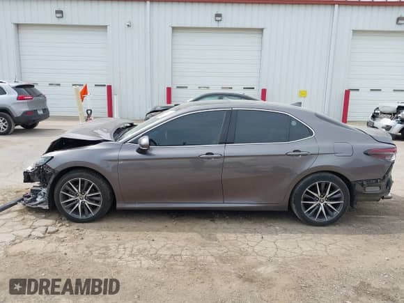 2022 Toyota Camry Hybrid XLE with VIN 4T1F31AK2NU573291, listed as a IAAI auction lot 42407207 with 65,222 mi miles and . Bid and sale history available at DreamBid. Image 14.