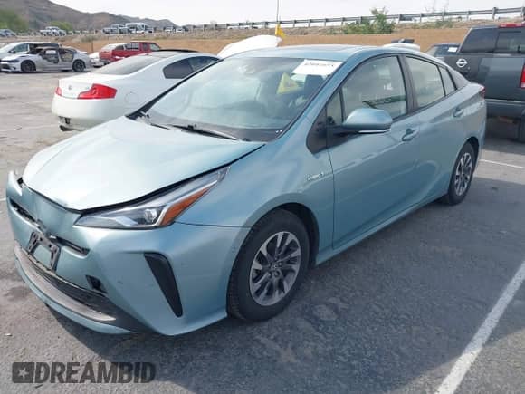 2021 Toyota Prius L Eco with VIN JTDKAMFU6M3127489, listed as a IAAI auction lot 42046658 with 126,249 mi miles and . Bid and sale history available at DreamBid. Image 17.