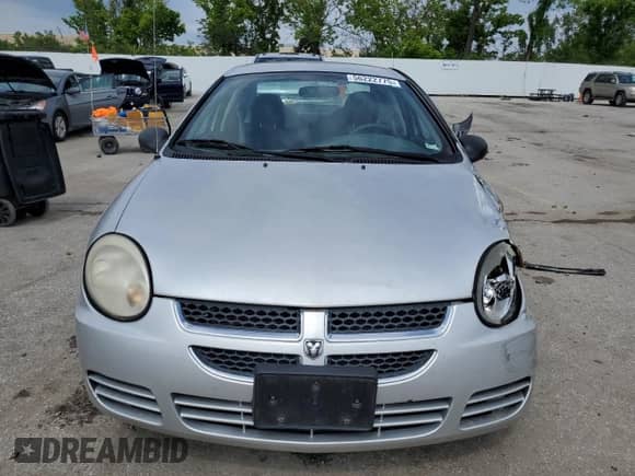 2005 Dodge Neon SXT z VIN 1B3ES56C15D149212, wystawiony jako Copart lot #56222775 z przebiegiem 112 383 mil mil oraz Szkoda całkowita • Salvage title. Historia ofert i sprzedaży dostępna na DreamBid. Obrazek 5.