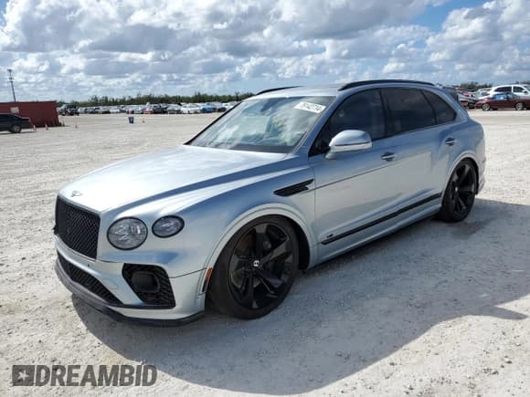 ✅ 2022 Bentley Bentayga V8 • VIN: SJAAM2ZV9NC011752 • Лот: 79142714. Опубликован ранее на Copart с пробегом Не указан. Бесплатный доступ к архиву аукционных продаж из США и подробный отчёт об истории автомобиля на DreamBid. Изображение 1.