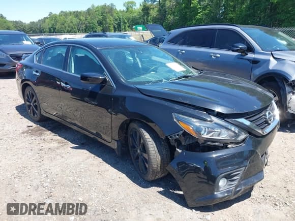 ✅ 2017 Nissan Altima SL • VIN: 1N4AL3AP4HC218516 • Lot: 42198623. Listed on IAAI with 86,084 mi. Free auction sales archive from the USA and detailed vehicle history report at DreamBid. Image 1.