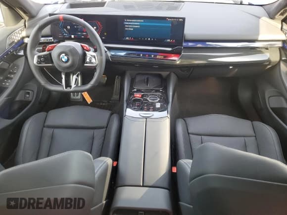 ✅ 2025 BMW M5 • VIN: WBS83FK02SCU89103 • Lot: 70166505. Listed on Copart with 1,147 mi. Free auction sales archive from the USA and detailed vehicle history report at DreamBid. Image 8.