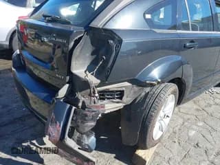 ✅ 2010 Dodge Caliber SXT • VIN: 1B3CB4HAXAD532248 • Лот: 43521429. Опубликован ранее на IAAI с пробегом Не указан. Бесплатный доступ к архиву аукционных продаж из США и подробный отчёт об истории автомобиля на DreamBid. Изображение 6.