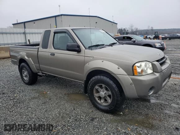 ✅ 2004 Nissan Frontier XE Desert Runner • VIN: 1N6ED26T34C460732 • Lot: 87469054. Listed on Copart with 184,837 mi. Free auction sales archive from the USA and detailed vehicle history report at DreamBid. Image 4.