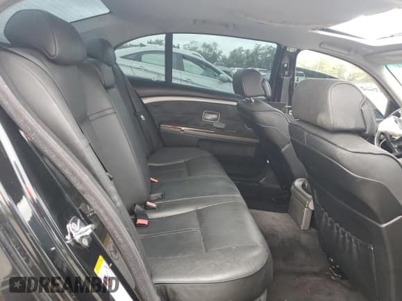 ✅ 2006 BMW 7 Series 750Li • VIN: WBAHN83596DT25366 • Лот: 71251924. Опубликован ранее на Copart с пробегом Не указан. Бесплатный доступ к архиву аукционных продаж из США и подробный отчёт об истории автомобиля на DreamBid. Изображение 11.