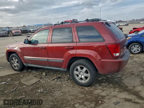 ✅ 2008 Jeep Grand Cherokee Laredo • VIN: 1J8GR48K38C102168 • Лот: 94066465. Опубликован ранее на Copart с пробегом 156 543 миль. Бесплатный доступ к архиву аукционных продаж из США и подробный отчёт об истории автомобиля на DreamBid. Изображение 2.