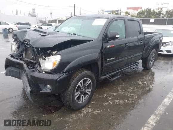 ✅ 2012 Toyota Tacoma PreRunner • VIN: 3TMKU4HN0CM032307 • Lot: 41576688. Listed on IAAI with 101,803 mi. Free auction sales archive from the USA and detailed vehicle history report at DreamBid. Image 2.