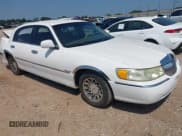 ✅ 1998 Lincoln Town Car Signature • VIN: 1LNFM82WXWY637398 • Lot: 42658093. Listed on IAAI with 91,600 mi. Free auction sales archive from the USA and detailed vehicle history report at DreamBid. Image 1.