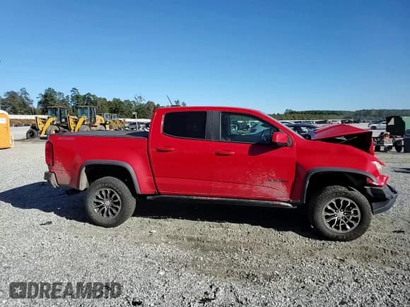✅ 2018 Chevrolet Colorado 4WD ZR2 • VIN: 1GCGTEEN3J1287157 • Lot: 82360205. Listed on Copart with 84,813 mi. Free auction sales archive from the USA and detailed vehicle history report at DreamBid. Image 14.