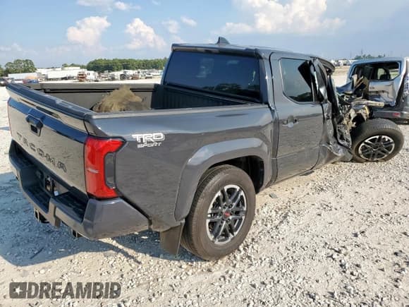 ✅ 2024 Toyota Tacoma SR5 • VIN: 3TMKB5FNXRM004585 • Lot: 80822375. Listed on Copart with 42,846 mi. Free auction sales archive from the USA and detailed vehicle history report at DreamBid. Image 3.