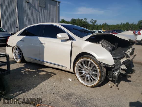✅ 2014 Cadillac XTS Platinum • VIN: 2G61S5S30E9125258 • Lot: 65366205. Listed on Copart with 164,506 mi. Free auction sales archive from the USA and detailed vehicle history report at DreamBid. Image 4.