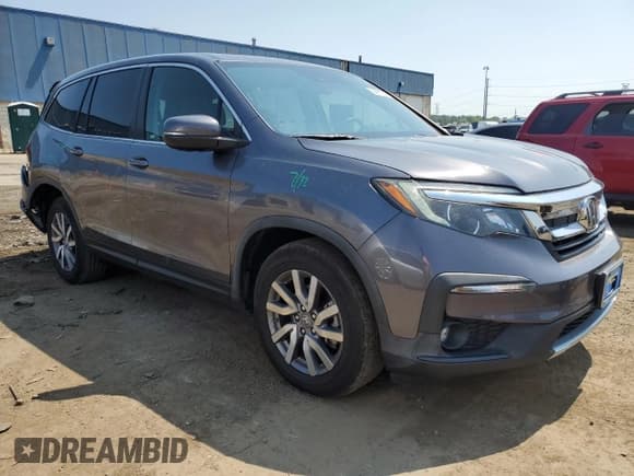 ✅ 2020 Honda Pilot EX-L • VIN: 5FNYF5H59LB006383 • Lot: 69061635. Wystawiony na Copart z przebiegiem 74 310 mil. Bezpłatny archiwum sprzedaży aukcyjnych z USA i szczegółowy raport historii pojazdu na DreamBid. Zdjęcie 4.