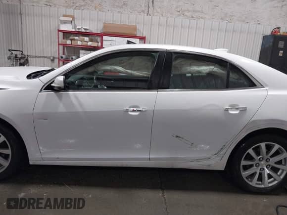 ✅ 2016 Chevrolet Malibu LTZ • VIN: 1G11E5SA2GF166772 • Lot: 42004657. Listed on IAAI with Not provided miles. Access the free auction sales archive from the USA and view a detailed vehicle history report at DreamBid. Image 13.