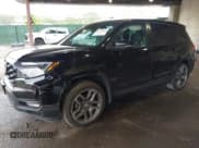 ✅ 2023 Honda Passport EX-L • VIN: 5FNYF8H52PB033173 • Lot: 42376245. Listed on IAAI with 24,134 mi. Free auction sales archive from the USA and detailed vehicle history report at DreamBid. Image 17.