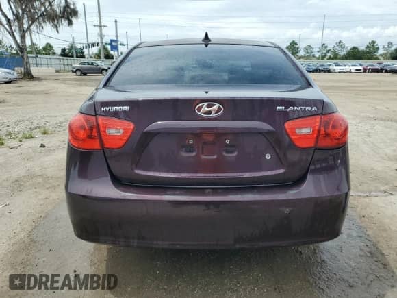 2009 Hyundai Elantra GLS z VIN KMHDU46D09U756114, wystawiony jako Copart lot #71651874 z przebiegiem 142 947 mil mil oraz Szkoda całkowita • Salvage title. Historia ofert i sprzedaży dostępna na DreamBid. Obrazek 6.