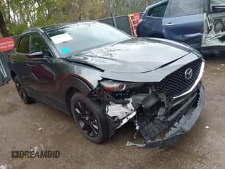 ✅ 2022 Mazda CX-30 Premium • VIN: 3MVDMBDY5NM407459 • Lot: 43511257. Listed on IAAI with 37,700 mi. Free auction sales archive from the USA and detailed vehicle history report at DreamBid. Image 1.