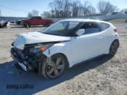 ✅ 2015 Hyundai Veloster Turbo • VIN: KMHTC6AEXFU239828 • Lot: 87089004. Wystawiony na Copart z przebiegiem 140 556 mil. Bezpłatny archiwum sprzedaży aukcyjnych z USA i szczegółowy raport historii pojazdu na DreamBid. Zdjęcie 1.