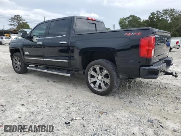 ✅ 2018 Chevrolet Silverado 1500 High Country • VIN: 3GCUKTEJ8JG503707 • Лот: 71804854. Опубликован ранее на Copart с пробегом 94 152 миль. Бесплатный доступ к архиву аукционных продаж из США и подробный отчёт об истории автомобиля на DreamBid. Изображение 2.
