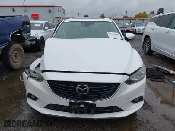 ✅ 2014 Mazda 6 i Grand Touring • VIN: JM1GJ1W67E1118643 • Lot: 43604649. Listed on IAAI with 147,515 mi. Free auction sales archive from the USA and detailed vehicle history report at DreamBid. Image 13.