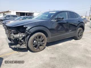 ✅ 2022 Mazda CX-30 2.5 Turbo • VIN: 3MVDMBAY6NM437882 • Lot: 64588415. Listed on Copart with 27,154 mi. Free auction sales archive from the USA and detailed vehicle history report at DreamBid. Image 1.