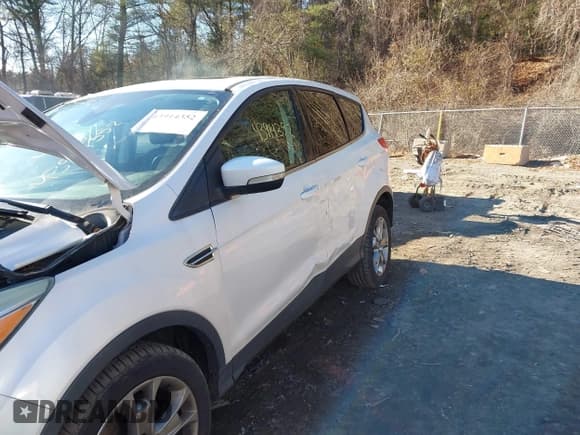 ✅ 2013 Ford Escape SEL • VIN: 1FMCU9HX4DUB19770 • Lot: 43914352. Wystawiony na IAAI z przebiegiem 165 188 mil. Bezpłatny archiwum sprzedaży aukcyjnych z USA i szczegółowy raport historii pojazdu na DreamBid. Zdjęcie 12.