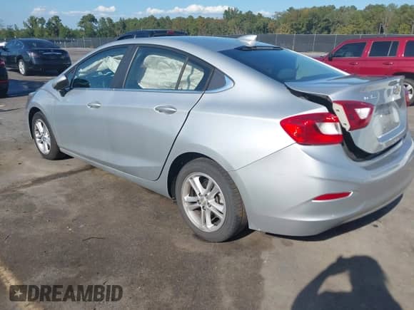 2016 Chevrolet Cruze LT z VIN 1G1BE5SM6G7266382, wystawiony jako IAAI lot #43297841 z przebiegiem 182 239 mil mil oraz . Historia ofert i sprzedaży dostępna na DreamBid. Obrazek 3.