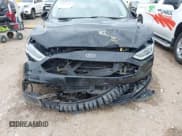 ✅ 2017 Ford Fusion Titanium • VIN: 3FA6P0K93HR186815 • Lot: 42595940. Listed on IAAI with 712,080 mi. Free auction sales archive from the USA and detailed vehicle history report at DreamBid. Image 6.