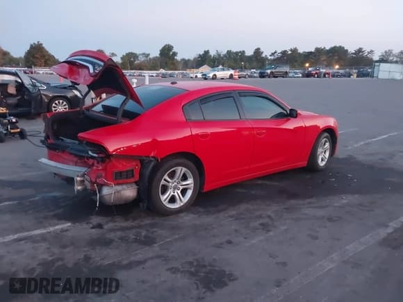 ✅ 2018 Dodge Charger SXT • VIN: 2C3CDXBG4JH169945 • Lot: 43223980. Listed on IAAI with 142,315 mi. Free auction sales archive from the USA and detailed vehicle history report at DreamBid. Image 4.