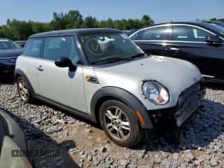 2013 MINI Hardtop with VIN WMWSU3C57DT546947, listed as a Copart auction lot 62088645 with 99,944 mi miles and Salvage title. Bid and sale history available at DreamBid. Image 4.