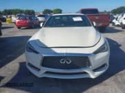 ✅ 2018 Infiniti Q60 Red Sport 400 • VIN: JN1FV7EL5JM631024 • Lot: 43881632. Listed on IAAI with 71,180 mi. Free auction sales archive from the USA and detailed vehicle history report at DreamBid. Image 6.