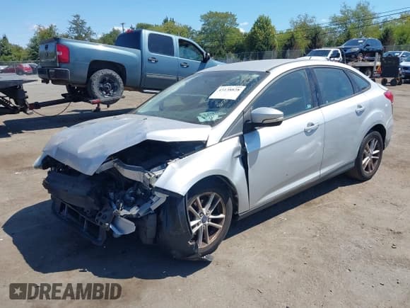 ✅ 2015 Ford Focus SE • VIN: 1FADP3F22FL365462 • Lot: 43138828. Listed on IAAI with 112,015 mi. Free auction sales archive from the USA and detailed vehicle history report at DreamBid. Image 2.