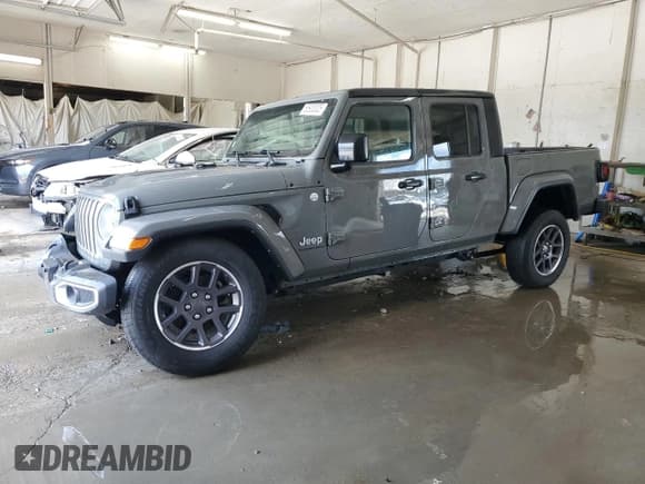 ✅ 2023 Jeep Gladiator Overland • VIN: 1C6HJTFG1PL523114 • Lot: 65930025. Listed on Copart with 43,645 mi. Free auction sales archive from the USA and detailed vehicle history report at DreamBid. Image 1.