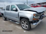 ✅ 2018 Chevrolet Silverado 1500 LT • VIN: 3GCPCREH4JG176023 • Лот: 42414198. Опубликован ранее на IAAI с пробегом 164 605 миль. Бесплатный доступ к архиву аукционных продаж из США и подробный отчёт об истории автомобиля на DreamBid. Изображение 1.