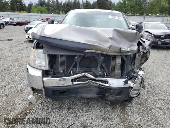 2007 Chevrolet Silverado 2500HD LTZ z VIN 1GCHK29617E602323, wystawiony jako Copart lot #57608705 z przebiegiem 194 719 mil mil oraz Szkoda całkowita • Salvage title. Historia ofert i sprzedaży dostępna na DreamBid. Obrazek 11.