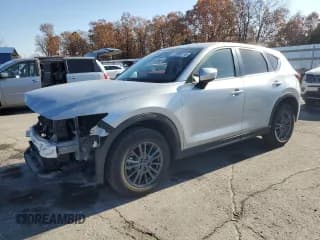 ✅ 2021 Mazda CX-5 Touring • VIN: JM3KFBCM0M0450973 • Lot: 92608715. Wystawiony na Copart z przebiegiem 91 044 mil. Bezpłatny archiwum sprzedaży aukcyjnych z USA i szczegółowy raport historii pojazdu na DreamBid. Zdjęcie 1.