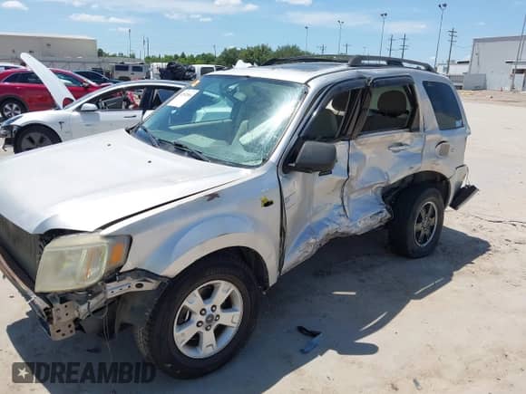 2010 Mercury Mariner z VIN 4M2CN8B75AKJ13322, wystawiony jako IAAI lot #42832064 z przebiegiem 205 074 mil mil oraz . Historia ofert i sprzedaży dostępna na DreamBid. Obrazek 6.