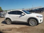 ✅ 2016 Mazda CX-5 Sport • VIN: JM3KE4BYXG0917498 • Lot: 43244914. Listed on IAAI with 112,801 mi. Free auction sales archive from the USA and detailed vehicle history report at DreamBid. Image 13.