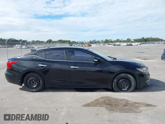 ✅ 2017 Nissan Maxima S • VIN: 1N4AA6AP7HC451412 • Lot: 43825866. Listed on IAAI with 132,409 mi. Free auction sales archive from the USA and detailed vehicle history report at DreamBid. Image 12.