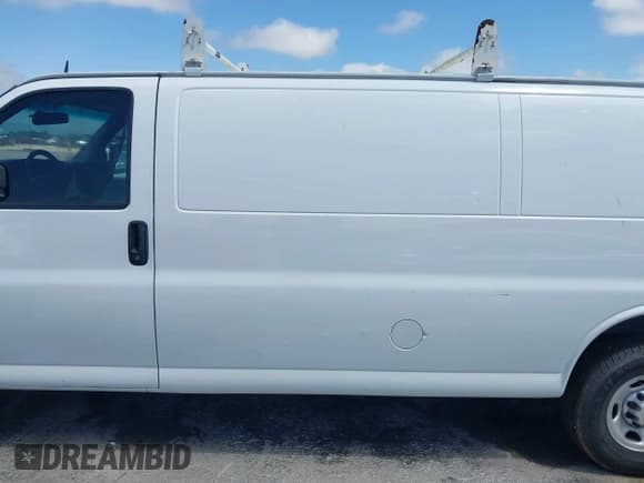✅ 2015 Chevrolet Express Cargo • VIN: 1GCWGGCF9F1229343 • Lot: 42333503. Listed on IAAI with 124,106 mi. Free auction sales archive from the USA and detailed vehicle history report at DreamBid. Image 14.