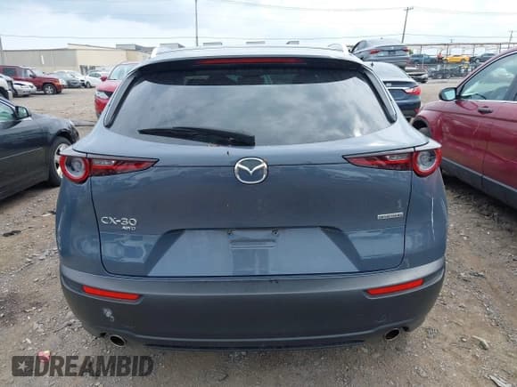 ✅ 2022 Mazda CX-30 S Carbon Edition • VIN: 3MVDMBCL7NM434765 • Lot: 42689789. Listed on IAAI with 27,767 mi. Free auction sales archive from the USA and detailed vehicle history report at DreamBid. Image 16.