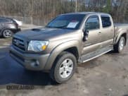 ✅ 2010 Toyota Tacoma PreRunner • VIN: 3TMKU4HN5AM025947 • Lot: 41330871. Listed on IAAI with 229,442 mi. Free auction sales archive from the USA and detailed vehicle history report at DreamBid. Image 2.