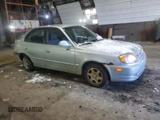 2005 Hyundai Accent GLS z VIN KMHCG45C15U602419, wystawiony jako Copart lot #47759675 z przebiegiem 58 133 mil mil oraz Szkoda całkowita • Salvage title. Historia ofert i sprzedaży dostępna na DreamBid. Obrazek 4.