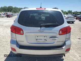 ✅ 2009 Hyundai Santa Fe GLS • VIN: 5NMSG13D59H267060 • Lot: 57821354. Listed on Copart with Not provided. Free auction sales archive from the USA and detailed vehicle history report at DreamBid. Image 6.