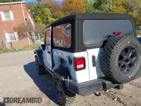 ✅ 2023 Jeep Wrangler Sport • VIN: 1C4GJXAG3PW699468 • Lot: 43322114. Listed on IAAI with 40,778 mi. Free auction sales archive from the USA and detailed vehicle history report at DreamBid. Image 3.