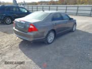 ✅ 2010 Ford Fusion Hybrid • VIN: 3FADP0L38AR281426 • Lot: 43627295. Wystawiony na IAAI z przebiegiem 181 129 mil. Bezpłatny archiwum sprzedaży aukcyjnych z USA i szczegółowy raport historii pojazdu na DreamBid. Zdjęcie 4.