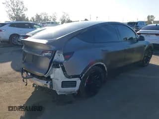 ✅ 2022 Tesla Model Y Performance • VIN: 7SAYGDEF6NF511484 • Lot: 43528941. Listed on IAAI with 88,929 mi. Free auction sales archive from the USA and detailed vehicle history report at DreamBid. Image 4.