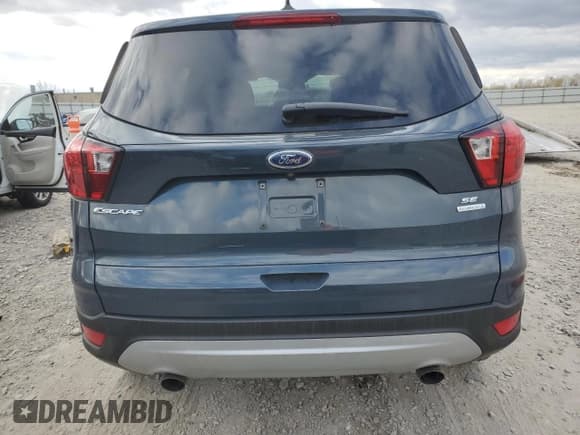 ✅ 2019 Ford Escape SE • VIN: 1FMCU0GDXKUB97700 • Лот: 90475295. Опубликован ранее на Copart с пробегом 113 685 миль. Бесплатный доступ к архиву аукционных продаж из США и подробный отчёт об истории автомобиля на DreamBid. Изображение 6.
